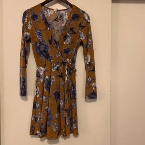 Beautiful, floral faux wrapped dress!